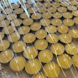 Actual photos of beeswax tea light candles in aluminum tins