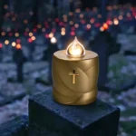 Small battery-operated cross-shaped graveside light