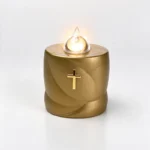 Small battery-operated cross-shaped graveside light