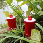 Wholesale of red artificial LED candles for use at gravesides during memorial services