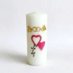 Wedding remembrance pillar candle, white pillar with wedding rings, doves and heart motifs for memorial tribute