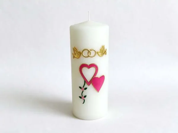 Wedding remembrance pillar candle, white pillar with wedding rings, doves and heart motifs for memorial tribute